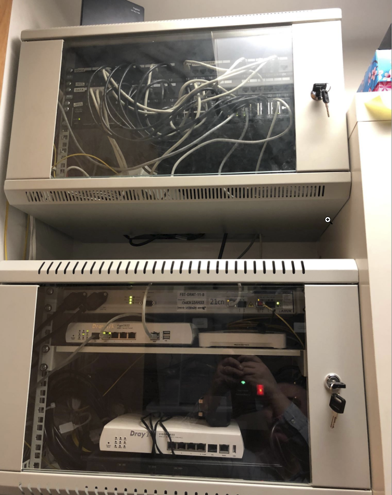 Before and after images of a network cabinet after it has been stripped down and tidied up