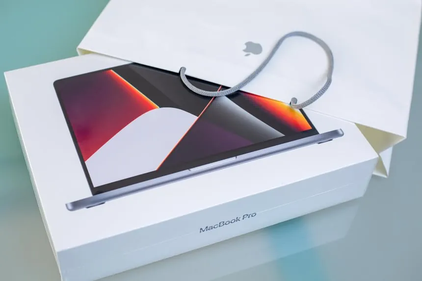 Apple Macbook boxed in a bag