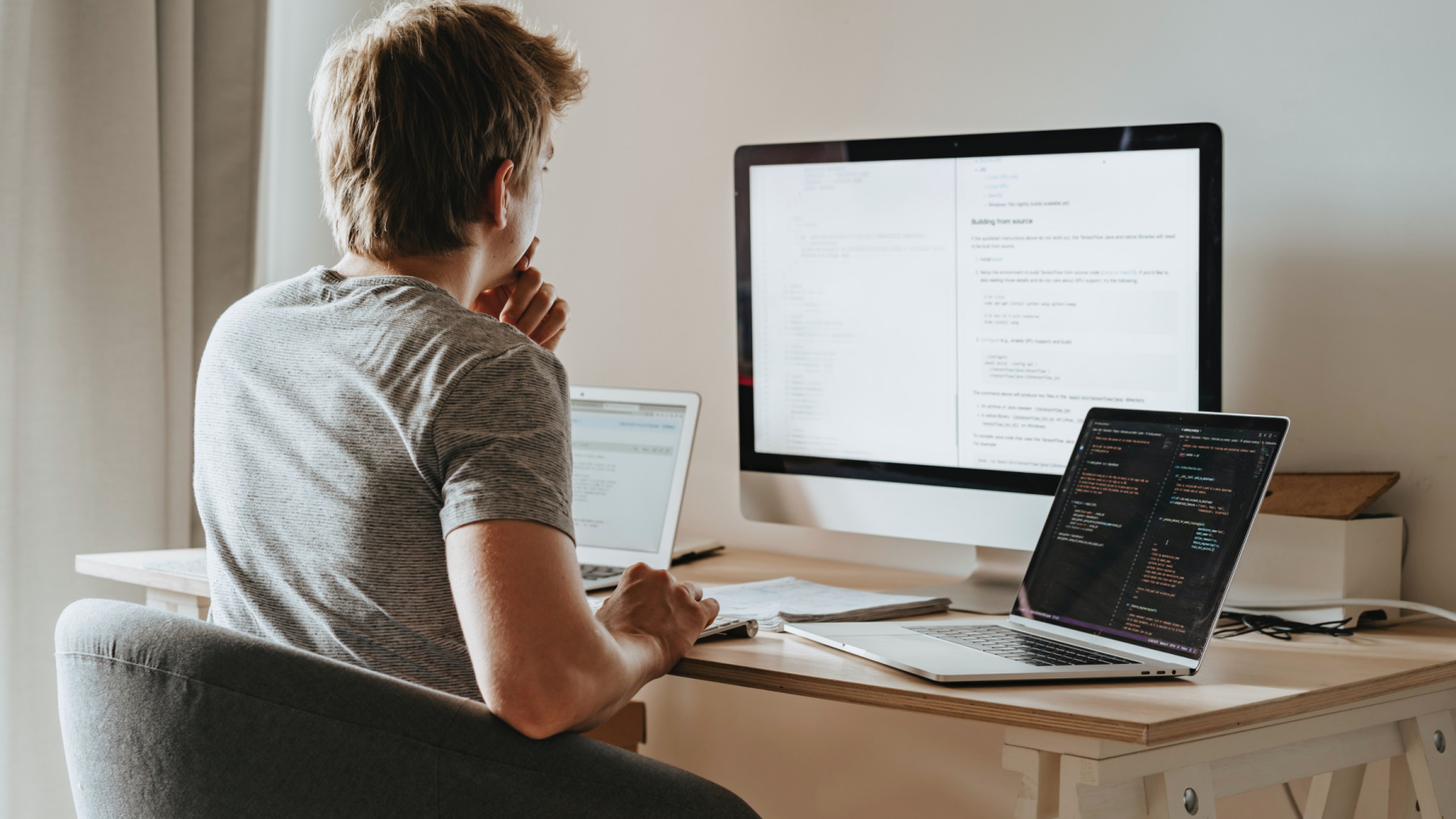 Man sat working at a computer