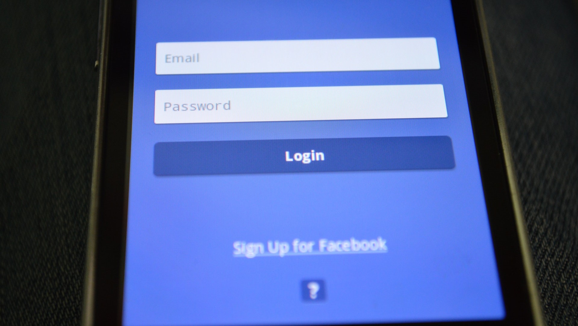 Facebook login page displayed on a smartphone